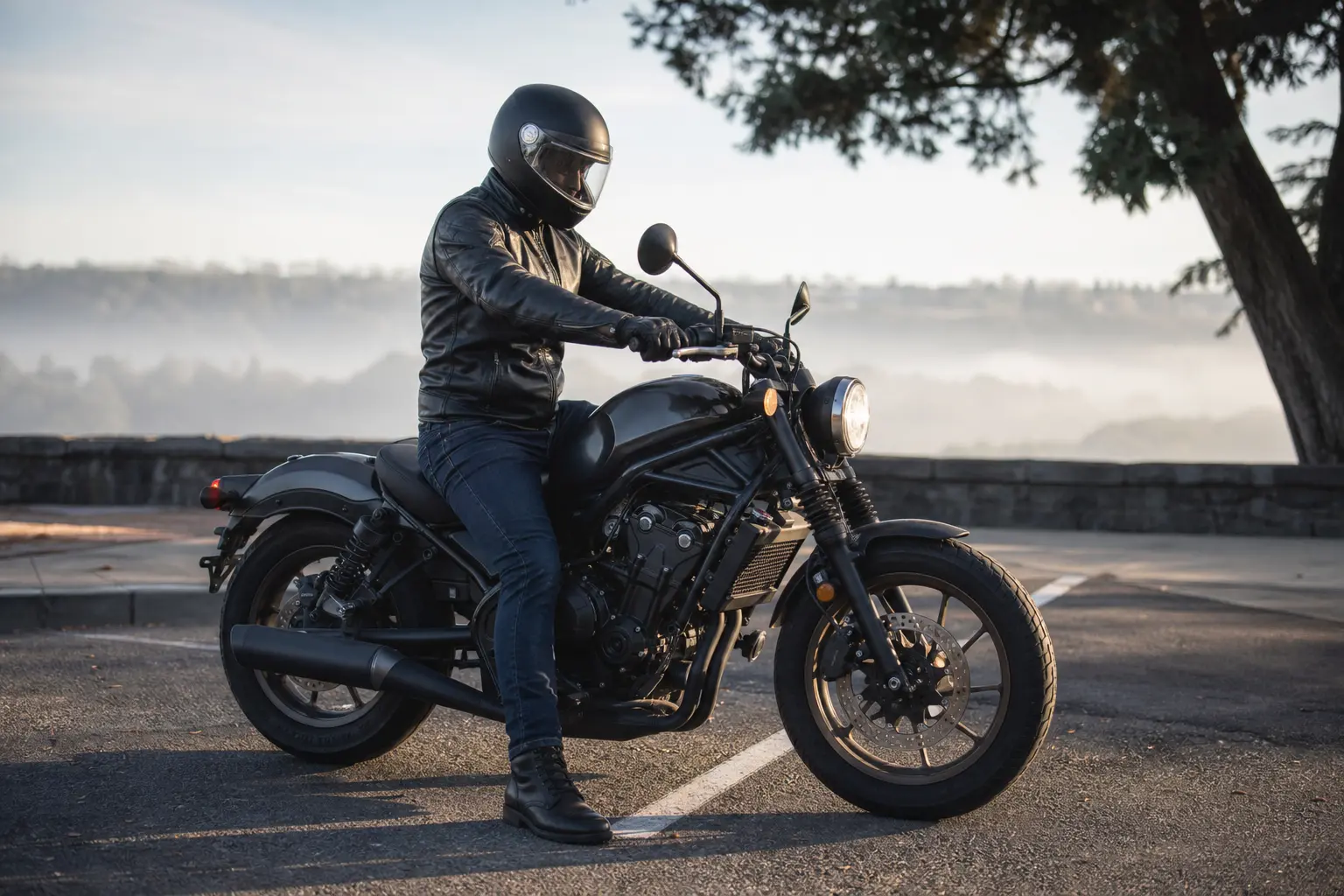 Motorcyclist checking gloves and boots while seated on a parked motorcycle.